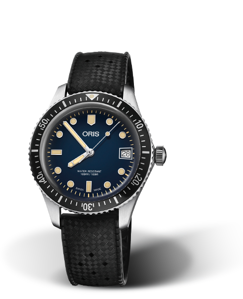 Divers Sixty-Five, 36.00 mm, Blue, Rubber Strap, Stainless steel screw-in security crown, Multi-piece stainless steel case, minutes scale top ring