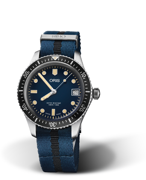Divers Sixty-Five, 36.00 mm, Blue, Textile Strap, Stainless steel screw-in security crown, Multi-piece stainless steel case, minutes scale top ring