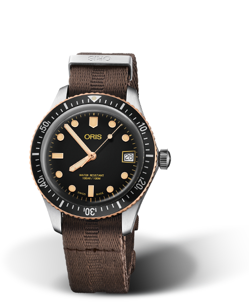 Divers Sixty-Five, 36.00 mm, Black, Textile Strap, Stainless steel screw-in security crown, Multi-piece stainless steel/bronze case, minutes scale top ring
