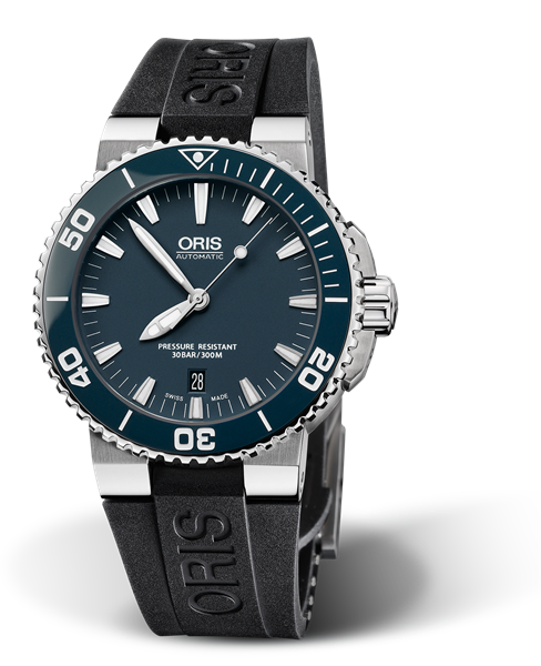 Aquis Date, 43.00 mm, Blue, Rubber Strap, Stainless steel screw-in security crown, Multi-piece stainless steel case, ceramic minutes scale top ring