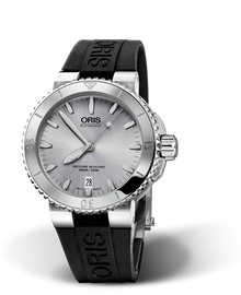 Aquis Date, 40.00 mm, Grey, Rubber Strap, Stainless steel screw-in security crown, Multi-piece stainless steel case, minutes scale top ring