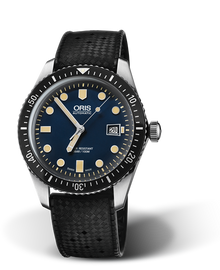 Divers Sixty-Five, 42.00 mm, Blue, Rubber Strap, Stainless steel screw-in security crown, Multi-piece stainless steel case, minutes scale top ring