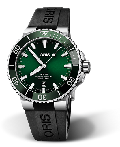 Aquis Date, 43.50 mm, Green, Rubber Strap, Stainless steel screw-in security crown, Multi-piece stainless steel case, ceramic minutes scale top ring