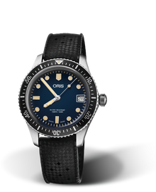 Divers Sixty-Five, 36.00 mm, Blue, Rubber Strap, Stainless steel screw-in security crown, Multi-piece stainless steel case, minutes scale top ring