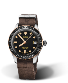 Divers Sixty-Five, 36.00 mm, Black, Textile Strap, Stainless steel screw-in security crown, Multi-piece stainless steel/bronze case, minutes scale top ring