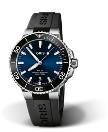 Aquis Date, 41.50 mm, Blue, Rubber Strap, Stainless steel screw-in security crown, Multi-piece stainless steel case, ceramic minutes scale top ring