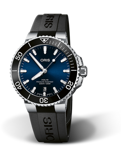 Aquis Date, 41.50 mm, Blue, Rubber Strap, Stainless steel screw-in security crown, Multi-piece stainless steel case, ceramic minutes scale top ring