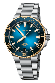 Aquis Date Calibre 400, 41.50 mm, Blue, Stainless steel Strap, Stainless steel screw-in security crown, Multi-piece stainless steel case, 18K yellow gold turning top ring, ceramic minutes scale top ring