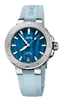 Aquis Date, 36.50 mm, Blue, Rubber Strap, Stainless steel screw-in security crown, Multi-piece stainless steel case, minutes scale top ring