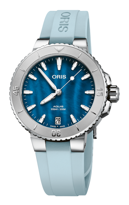Aquis Date, 36.50 mm, Blue, Rubber Strap, Stainless steel screw-in security crown, Multi-piece stainless steel case, minutes scale top ring