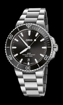 Aquis Date, 41.50 mm, Black, Stainless steel Strap, Stainless steel screw-in security crown, Multi-piece stainless steel case, ceramic minutes scale top ring