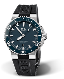 Aquis Date, 43.00 mm, Blue, Rubber Strap, Stainless steel screw-in security crown, Multi-piece stainless steel case, ceramic minutes scale top ring