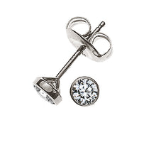 Solitär Ohrstecker Zargen-Fassung Weissgold 750 2 H SI Brillanten à je 0.05ct.