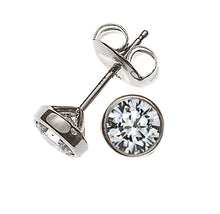 Solitär Ohrstecker Zargen-Fassung Weissgold 750 1.00ct. 2 H SI Brillanten à je 0.50ct.